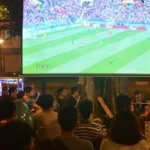 Watching football at the café